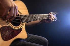 person playing guitar
