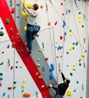 People climbing a rock wall