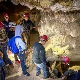students in cave